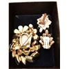 Image 4 : 442.  White thermaset and rhinestone broach, and clip earrings, 1950’s