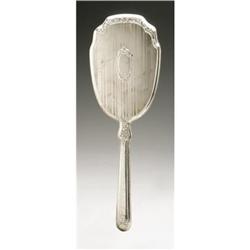 AN AMERICAN STERLING SILVER HAND MIRROR