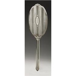 AN AMERICAN STERLING SILVER HAND MIRROR