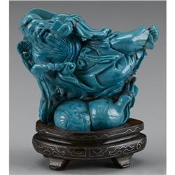 CHINESE CARVED TURQUOISE FIGURE OF A WISEMAN