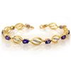 Image 1 : 5.60 ctw Tanzanite & Diamond Bracelet 10k Yellow Gold - REF-76G4W
