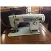 Image 2 : SEWING MACHINE IN TABLE WITH BOX OF SEWING SUPPLIES