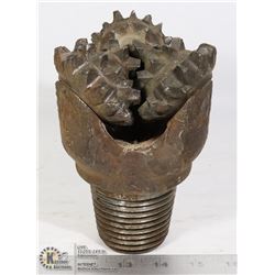BOX WITH 4 INCH OILFIELD DRILL BIT
