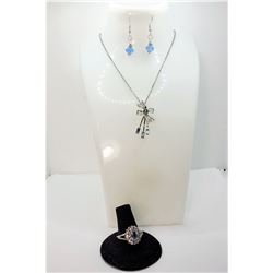 22)  PALE BLUE CRYSTAL & SILVER TONE SUITE