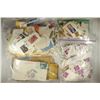 Image 1 : BAGS OF CUT VINTAGE US & FOREIGN STAMPS