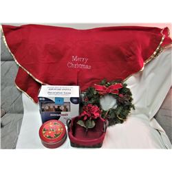 12" door Christmas wreath, 36" tree skirt, 7" Christmas tin, 8X9X5 basket, 7 1/2' mini lights