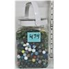 Image 1 : Plastic jar full of marbles, assortment