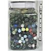 Image 2 : Plastic jar full of marbles, assortment
