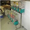 Image 2 : 10 HEAD 25 CENT CANDY MACHINE ON ROLLER STAND WITH KEY