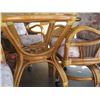 Image 2 : RATTAN TABLE WITH GLASS TOP & 4 SWIVEL CHAIRS ON CASTERS