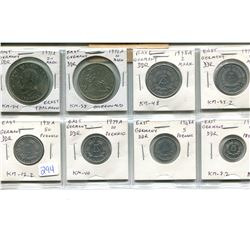 Lot of 8 different East German (DDR) coins including high denominations: Ernst Thalmann 20 mark, Buc