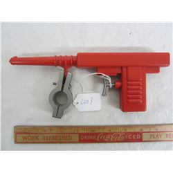 Plastic 1960's Bicycle Water Gun attaches to bike with clamp