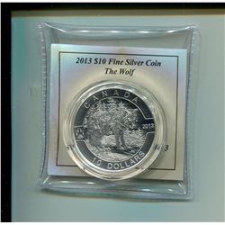 2013 Lone Wolf $10. .9999 pure silver. Housed in a hard plastic holder. Only 34,899 sold. Proof.