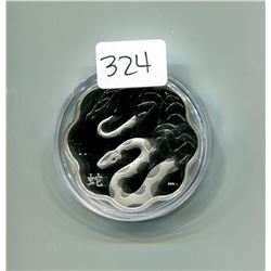 2013 Year of the Snake $10. .9999 pure silver. Housed in a hard plastic holder. Only 5,647 sold. Spe