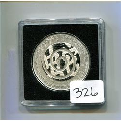 2013 Year of the Snake $15. Silver Lunar Lotus Series. Scalloped edge. Housed in a hard plastic hold