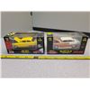 Image 1 : 2 NIB 1:64 scale 1955 chevys