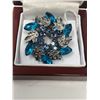 Image 2 : 96. Blue rhinestone circle broach with icing