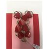 Image 2 : 98. Red thermoset broach and clip earrings, marked “Coro”