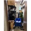 Image 1 : Shelving, cart, xmas decor, large black tote, suitcase. Large lot. Pickup at 11 am