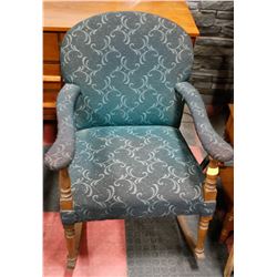 1940S UPHOLSTERED ROCKING CHAIR