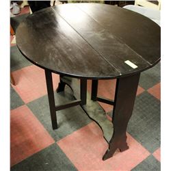 VINTAGE SOLID WOOD DROP LEAF TABLE. 38 X 30