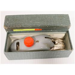 1950S RUBY BUTTON HOLER IN BOX