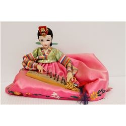 1950S JAPANESE DOLL SEATED. 10 X 7