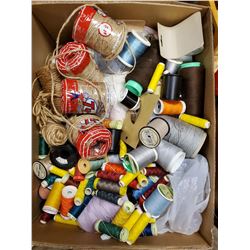 BOX OF ASSORTED THREADS AND NOTIONS