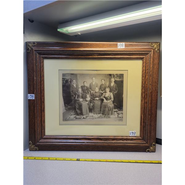 17" X 19" original 1883 family photo group in antique oak glass frame