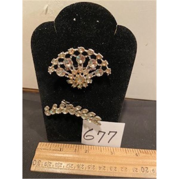 2 crystal brooches