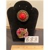 Image 1 : pair of red brooches