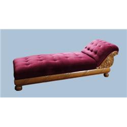 ART DECO - A carved fruitwood day bed with scroll decoration