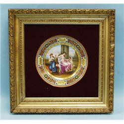 An antique Old Vienna porcelain wall plate. With a hand pain