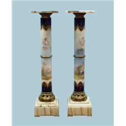A pair of antique French Sevres porcelain pedestals with gil