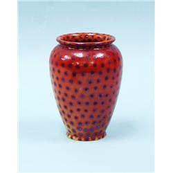 ZSOLNAY, PECS. A hand painted faience vase with iridescent p