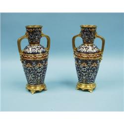 A fine pair of antique French ormolu mounted champleve decor
