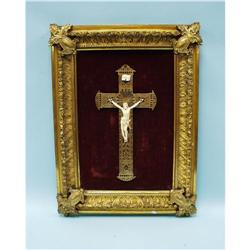 An early 19th century Italian gilt bronze crucifix mounted w