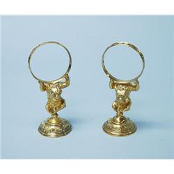 CHRISTOFLE, PARIS. A well cast pair of French gilt bronze fi