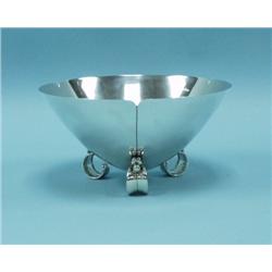 TIFFANY & CO. A sterling silver centrepiece on tri-footed ba