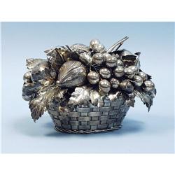 MARIO BUCCELLATI - A silver covered basket. The oval base wi