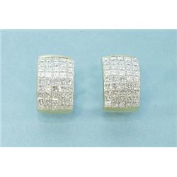 A pair of 18 kt. yellow gold and diamond earrings. Each earr