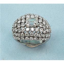 A very good platinum and diamond cocktail ring. Set with a f