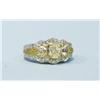 Image 1 : An 18 kt. white gold and diamond band ring set with three ov