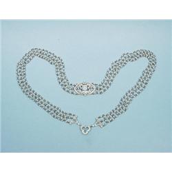 An elegant Belle Epoque design 18 kt. gold, platinum and see