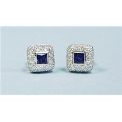 A pair of 18 kt. white gold and sapphire earrings. Each squa