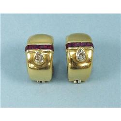 A pair of 1940's 18 kt. yellow gold and diamond earrings. Ea