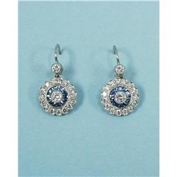 A pair of fine 18 kt. white gold and diamond earrings. Each 