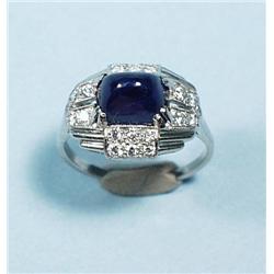 ART DECO - A platinum and diamond cocktail ring set with a f