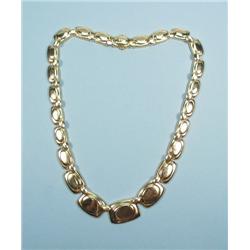 A "chunky" 18 kt. yellow gold necklace designed of graduated