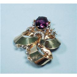 A large 1940s 18 kt. gold and diamond spray brooch. Set with